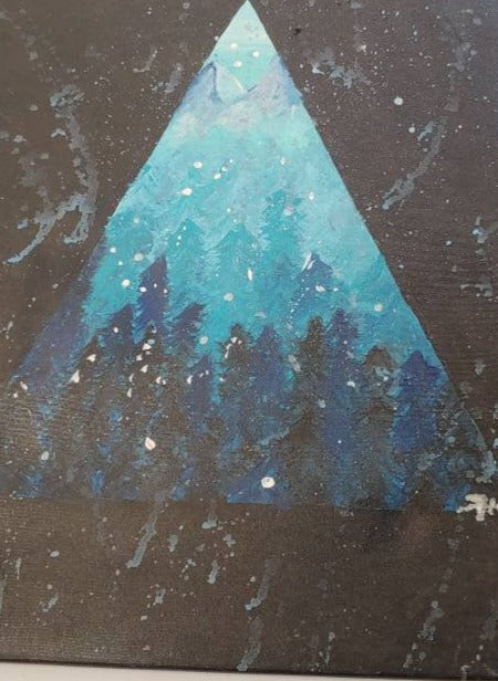 large triangle containing blue coloured forest snow storm scene surrounded by black.. storm continues over black