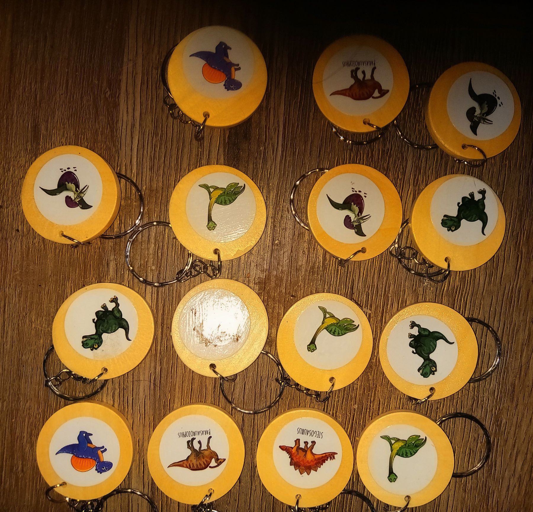  1 inch wooden double sided keyrings featuring dinosaurs