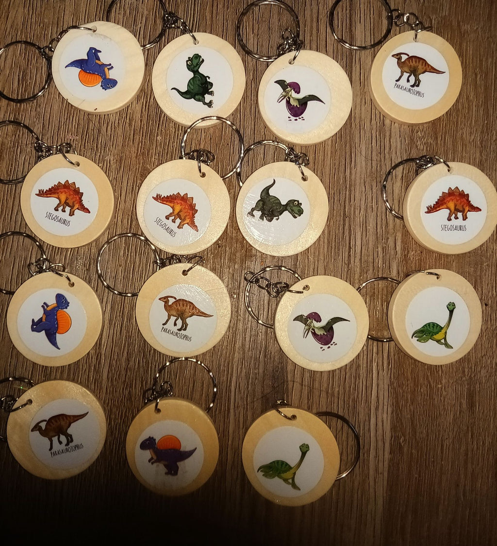  1 inch wooden double sided keyrings featuring dinosaurs