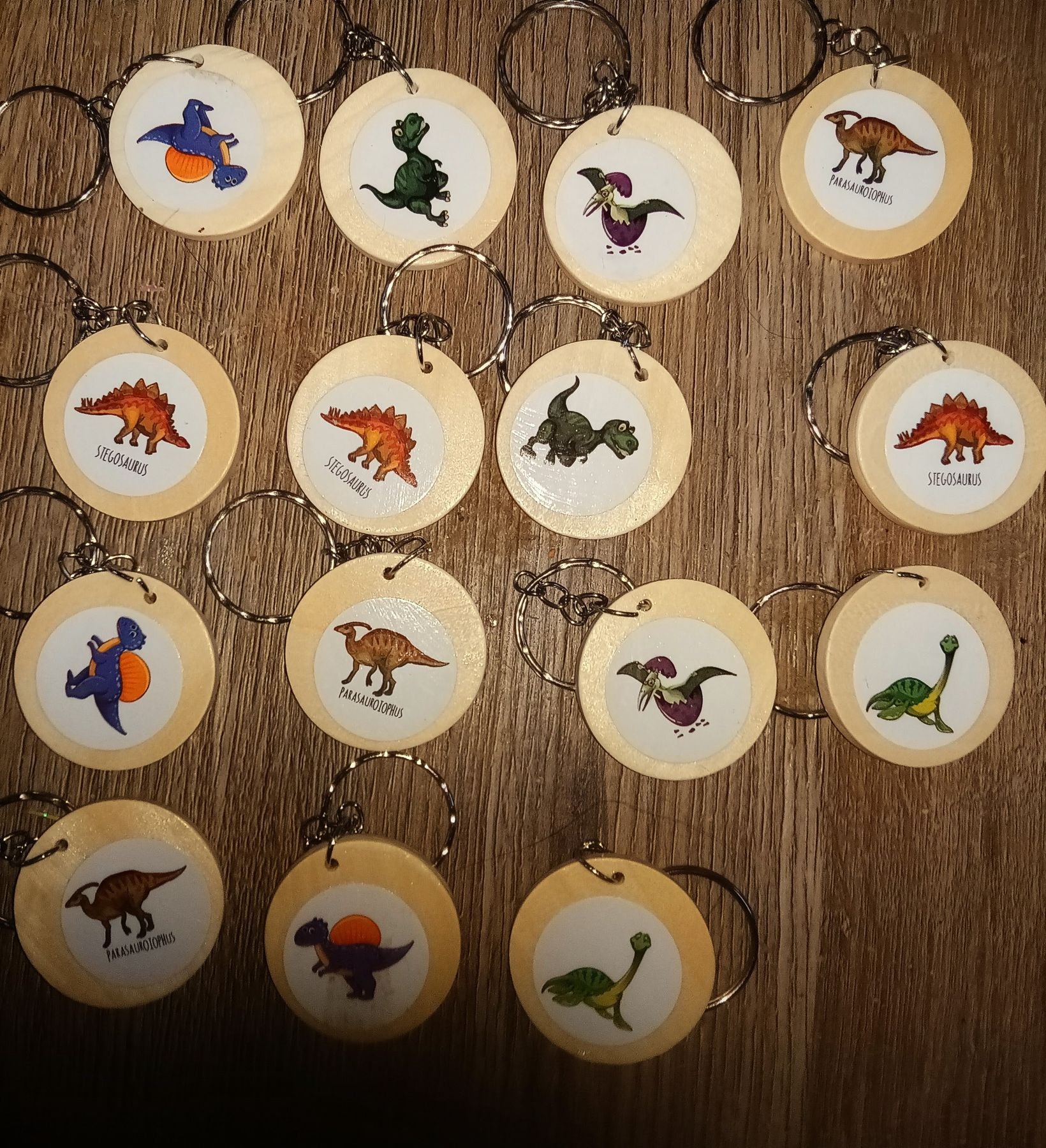  1 inch wooden double sided keyrings featuring dinosaurs